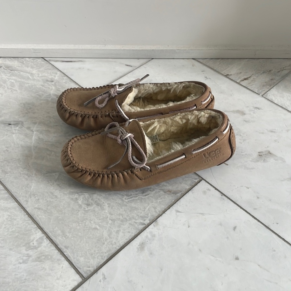 Ugg Dakota moccasin slippers.